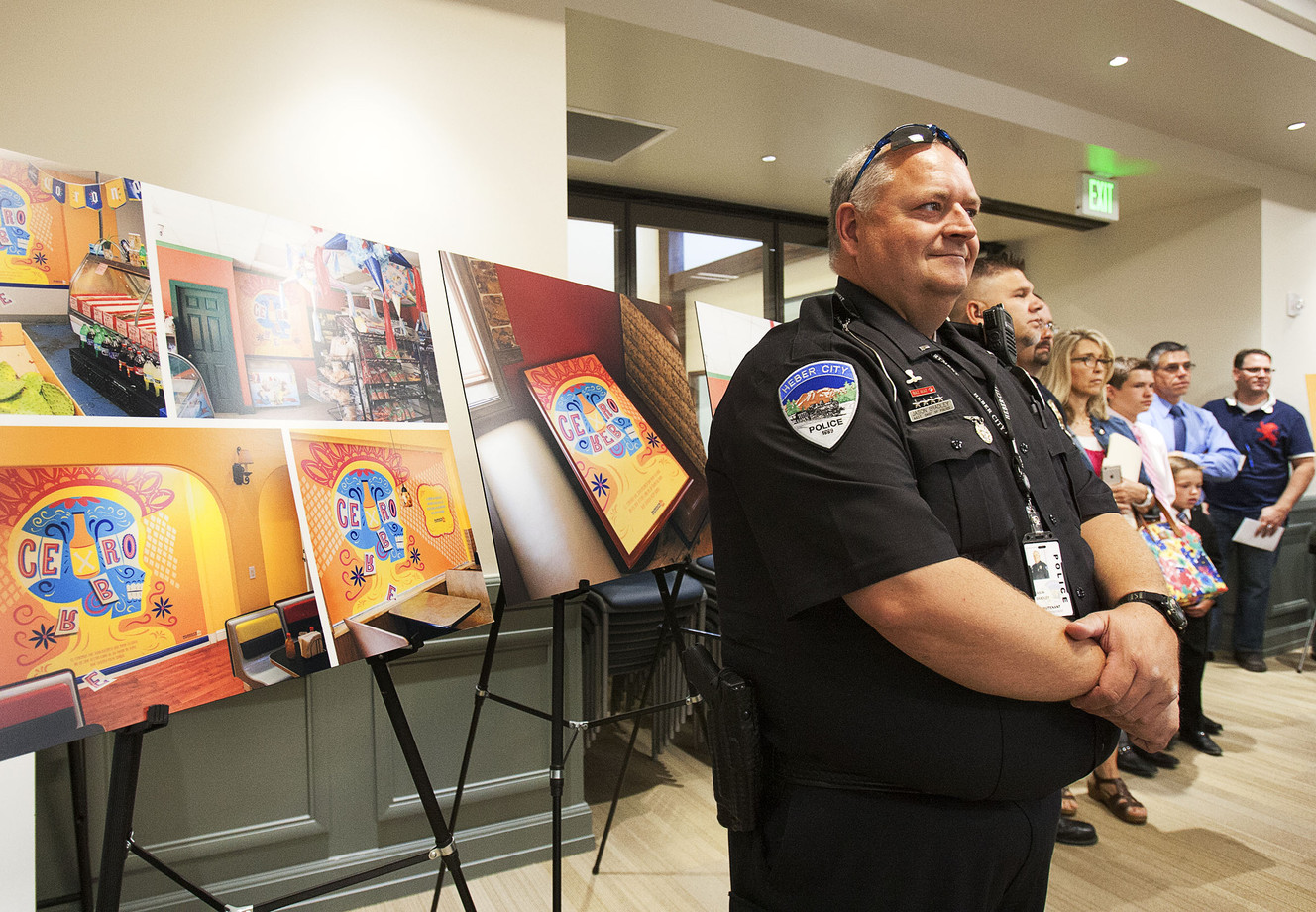 Heber City Police Lt. Jason Brandlet stands in front of boards displaying the Underage Drinking Prevention Initiative's logo in Heber City on Tuesday, July 12, 2016. (Photo: Hans Koepsell, Deseret News)
