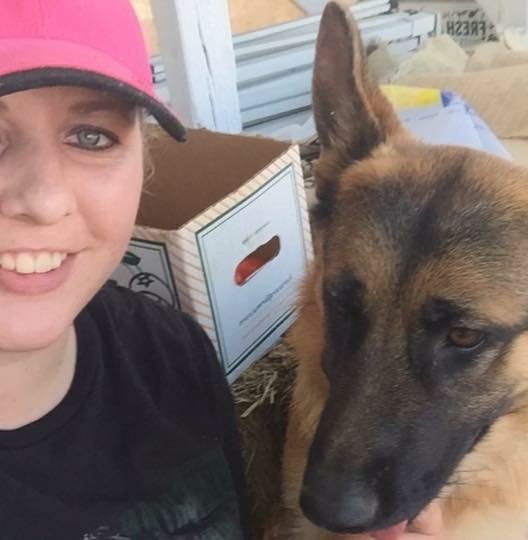 Jessie Brimhall with the dog, Sascha, which her family and co-workers gave her after the fire in March 2015. (Photo: Jessie Brimhall)