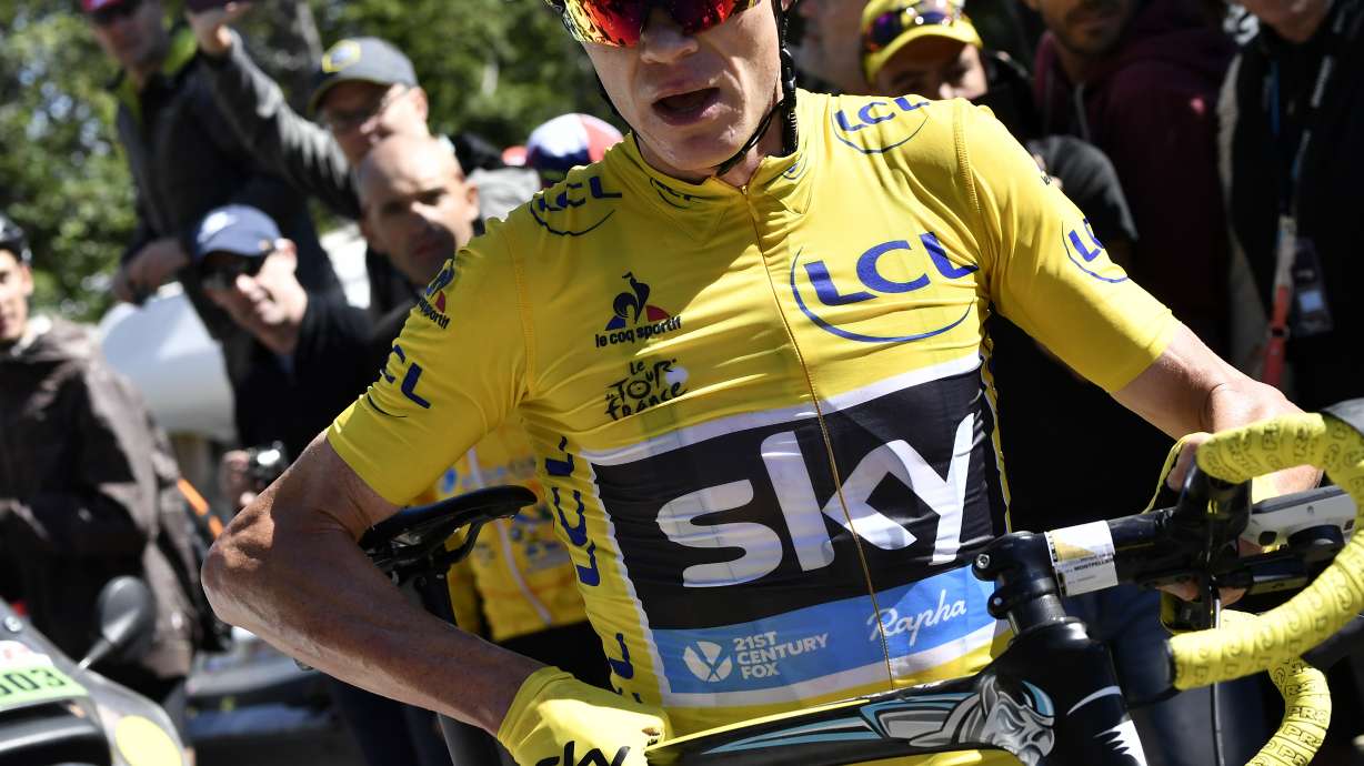 Froome stamps authority on day of mourning at Tour de France