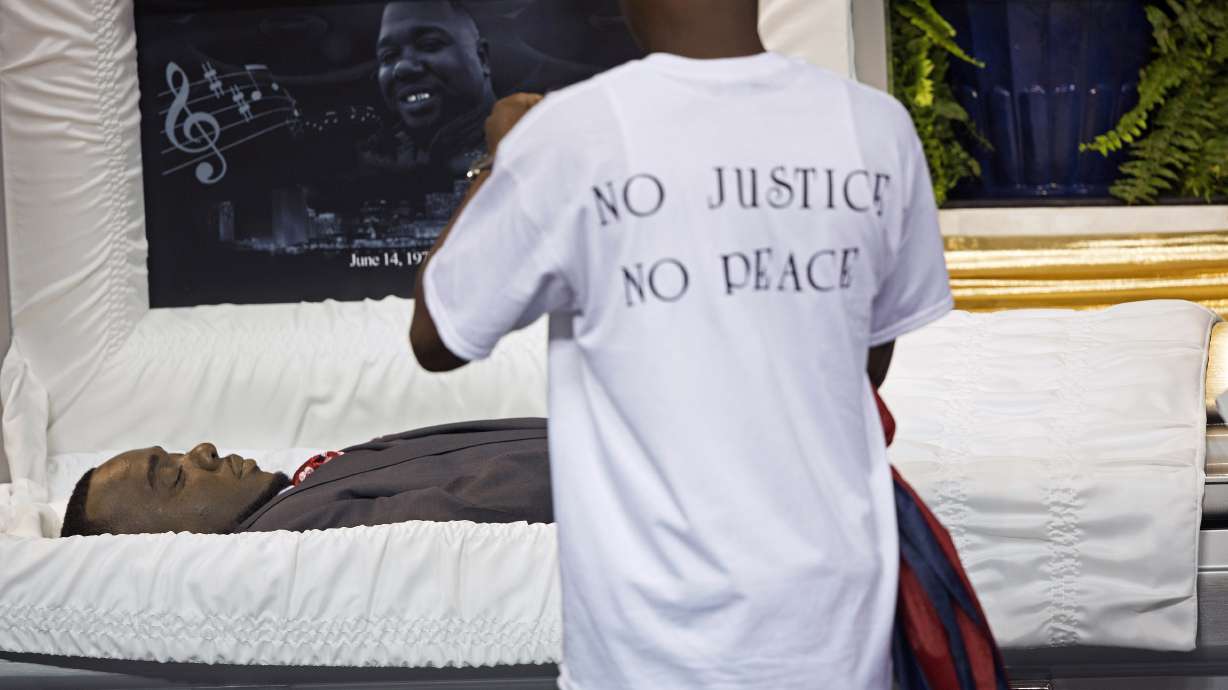 The Latest: Fourth suspect in pawn shop robbery arrested