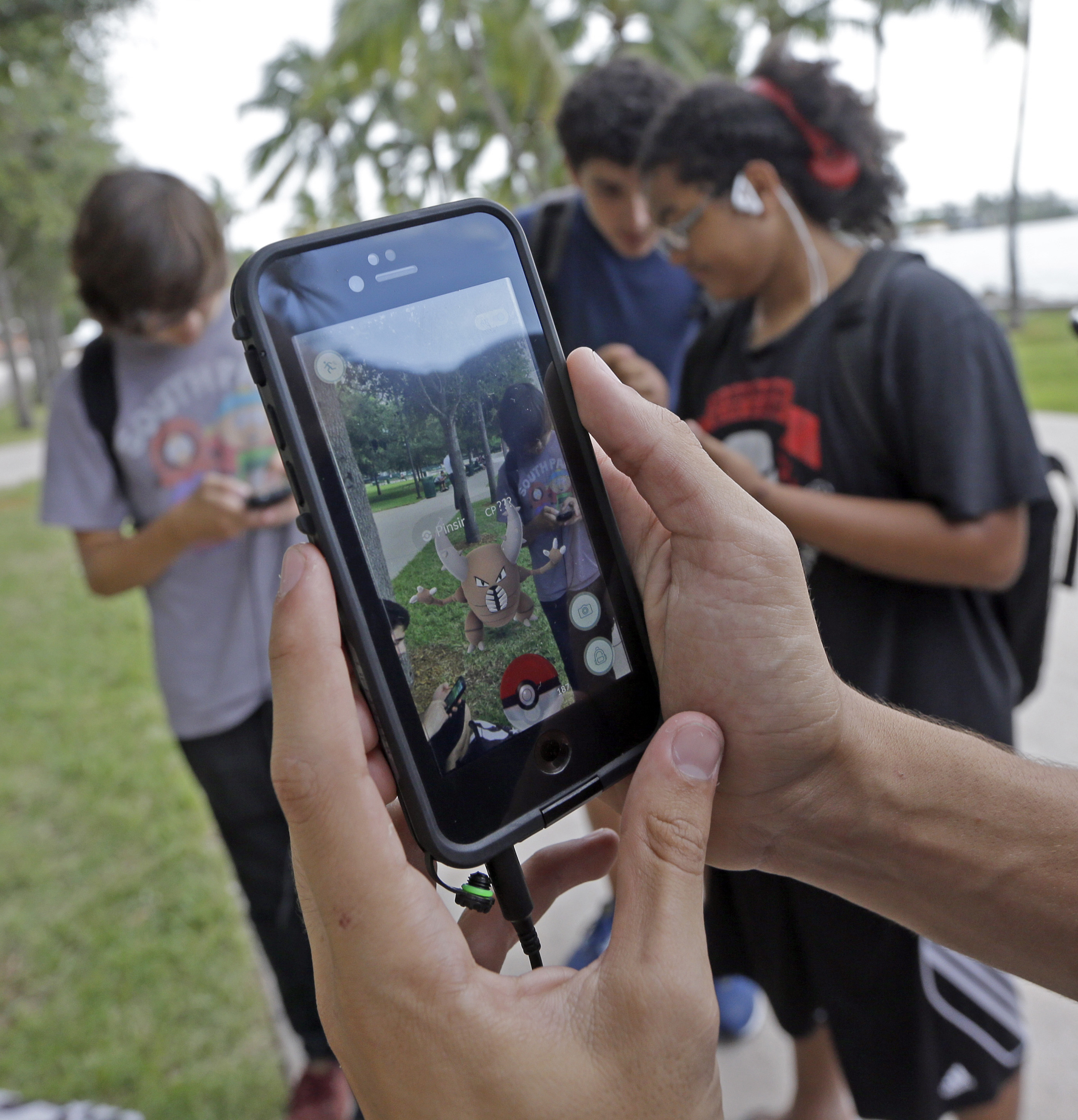 The Latest: Celebrities among the fans searching for Pokemon