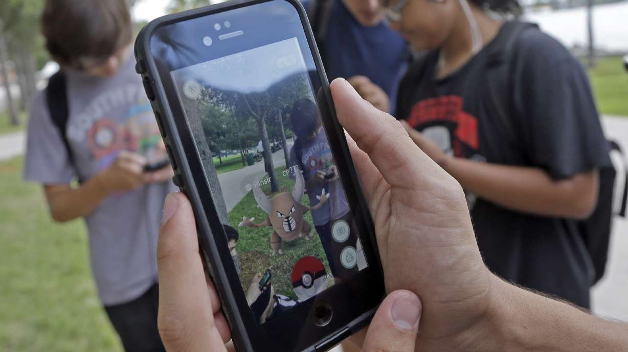 The Latest: Celebrities among the fans searching for Pokemon