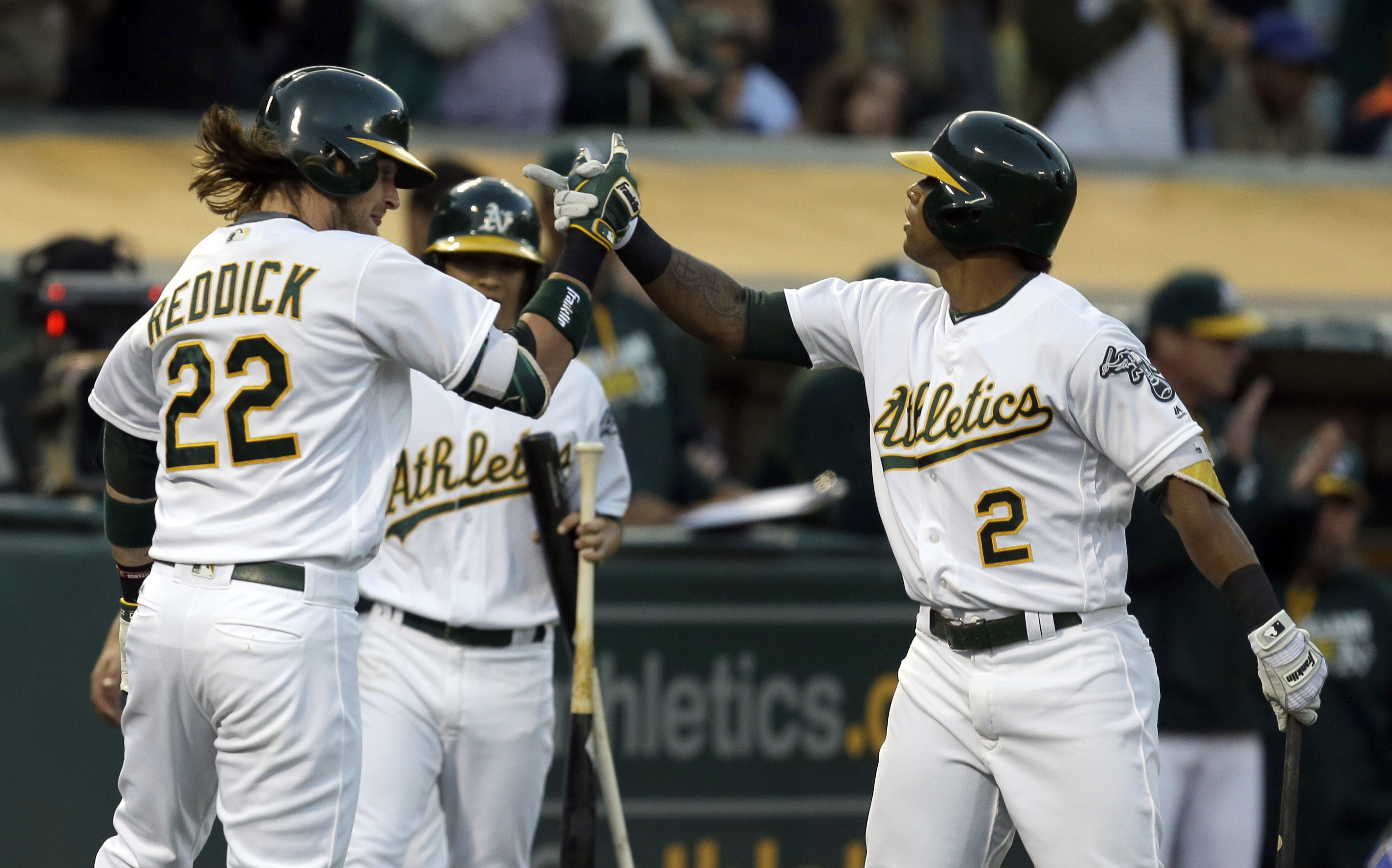 A's beat Blue Jays 8-7 with help of instant replay