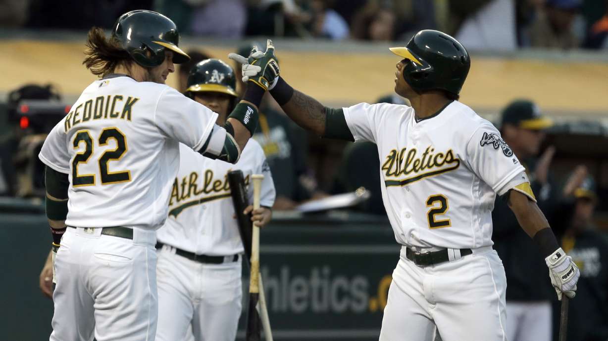 A's beat Blue Jays 8-7 with help of instant replay