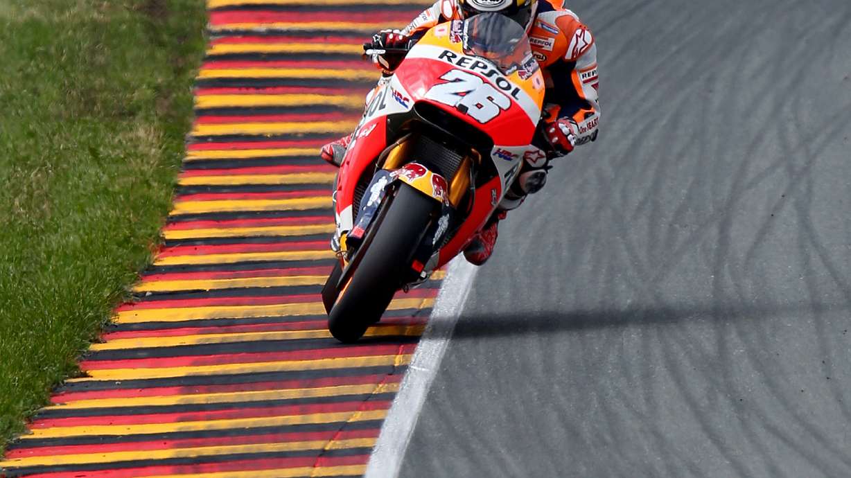 Honda rider Marquez gains 4th straight pole at German GP