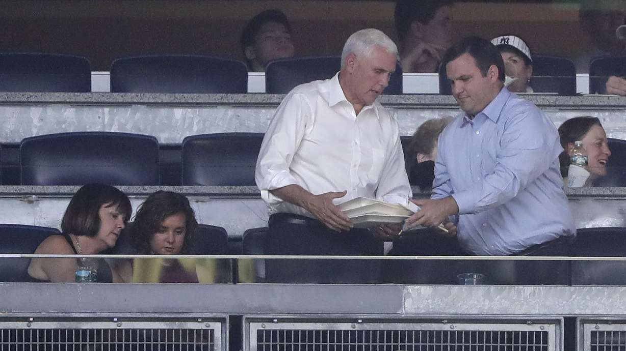 The Latest: Trump campaign names staffers to help Pence