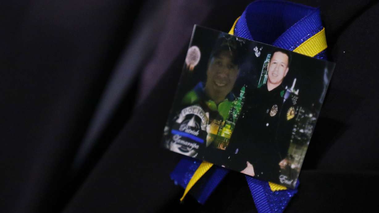 Law enforcement, Navy personnel mourn slain Dallas officer