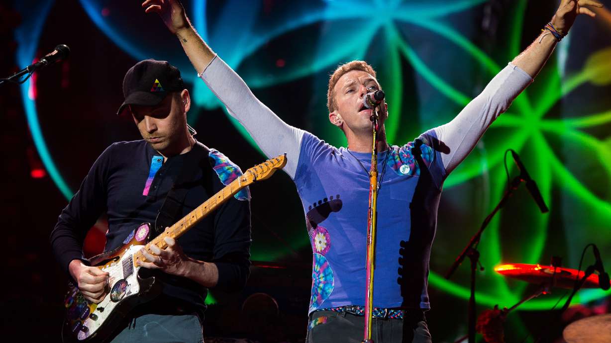 Coldplay kicks off stadium tour with colorful show