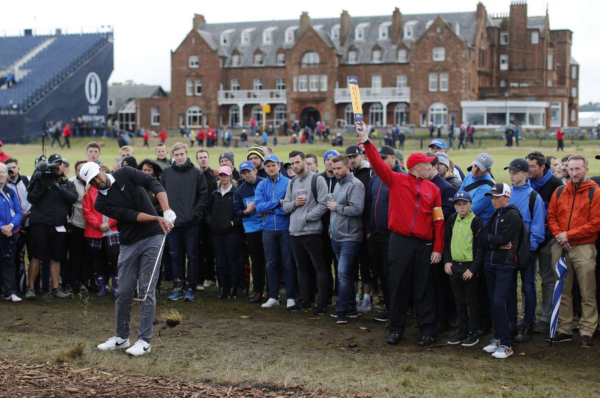 Tony Finau of Lehi hits out of the rough to the first green during the final round of the British Open Golf Championship at the Royal Troon Golf Club in Troon, Scotland, Sunday, July 17, 2016. (AP Photo/Ben Curtis)