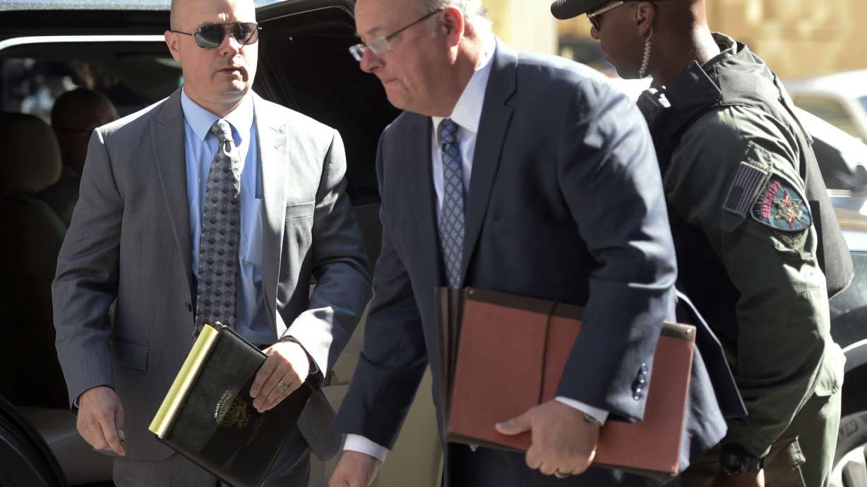 The Latest: Hogan doesn't see point of more officer trials