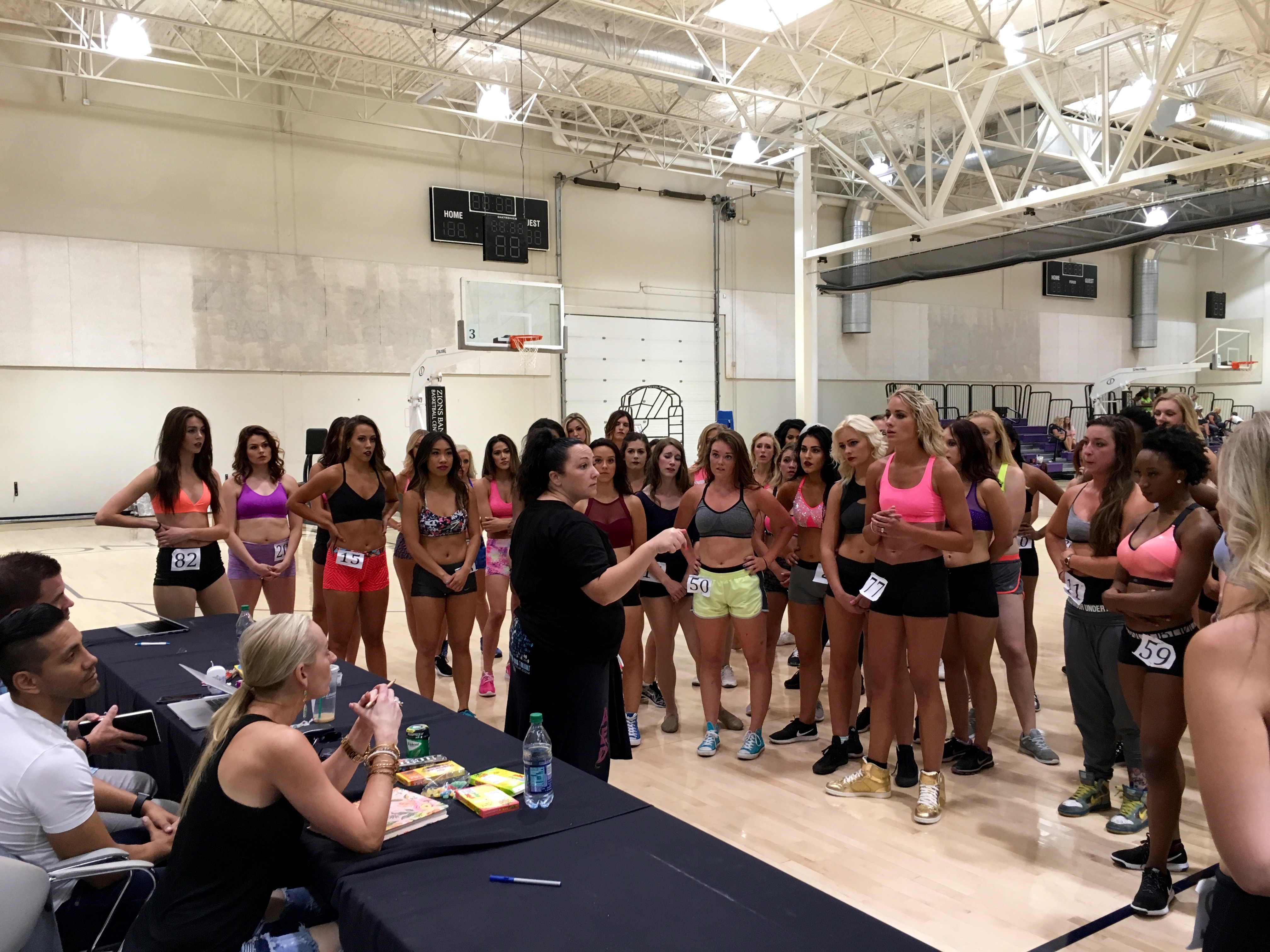 Prospective Jazz Dancers listen to Kristi Crader as she teaches them a tryout routine.