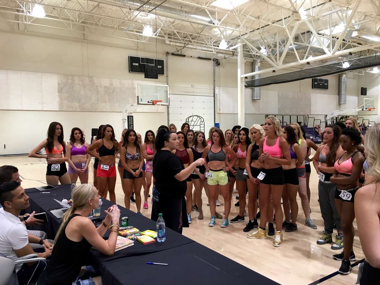 Prospective Jazz Dancers listen to Kristi Crader as she teaches them a tryout routine.