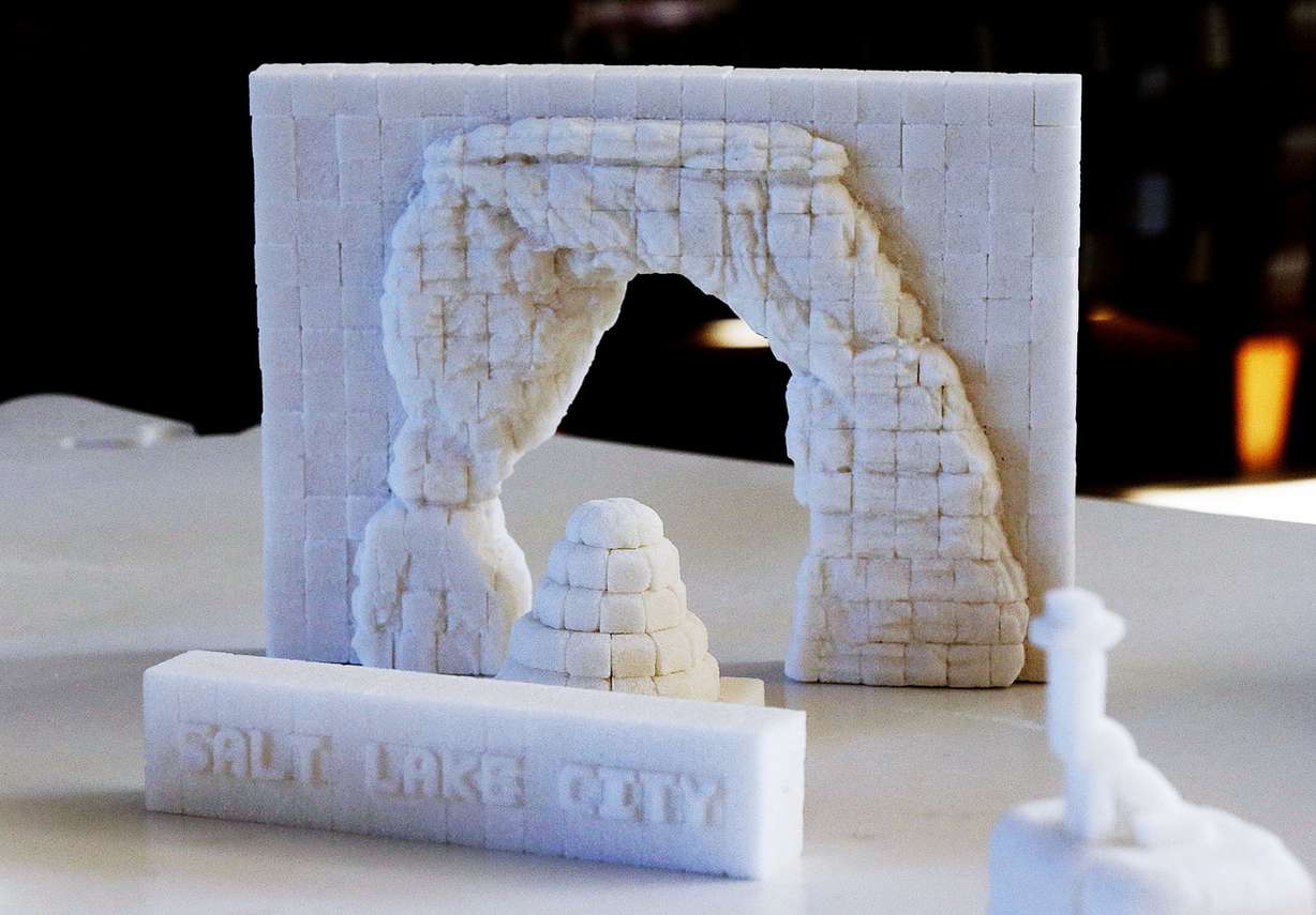 A sculpture of a beehive and Delicate Arch are part of a display at Intermountain Medical Center in Murray on Monday, July 18, 2016. Sculptors Brendan Jamison and Mark Revels displayed their work to raise awareness on how to manage sugar intake for a healthy lifestyle. (Photo: Ravell Call, Deseret News)