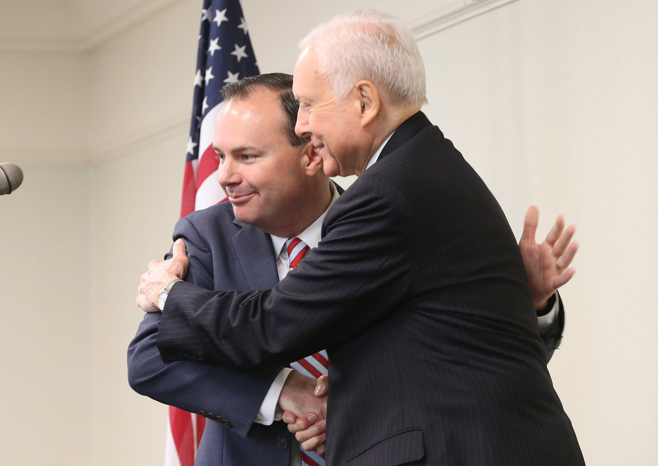 Sen. Mike Lee, R-Utah, and Sen. Orrin Hatch, R-Utah, hug prior to speaking to Utah delegates in Akron, Ohio, prior to the National Republican Convention on Monday, July 18, 2016. (Photo: Jeffrey D. Allred, Deseret News)