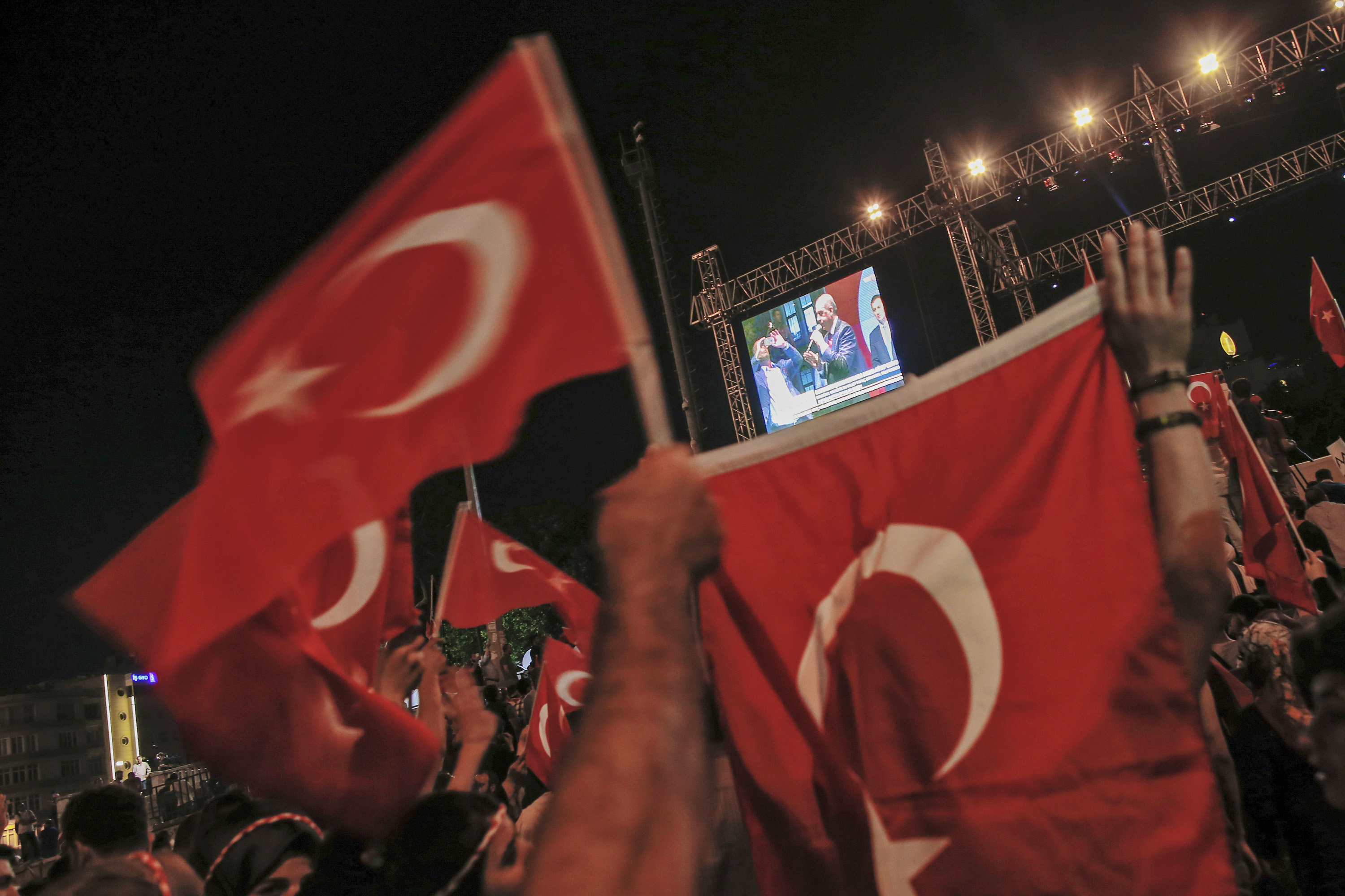 Turkey fires tens of thousands in coup plotters hunt