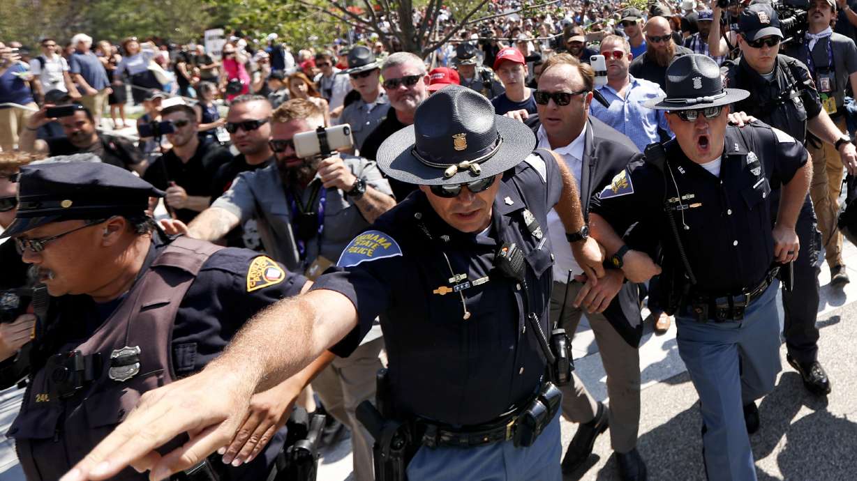 17 arrested in flag-burning melee outside GOP convention