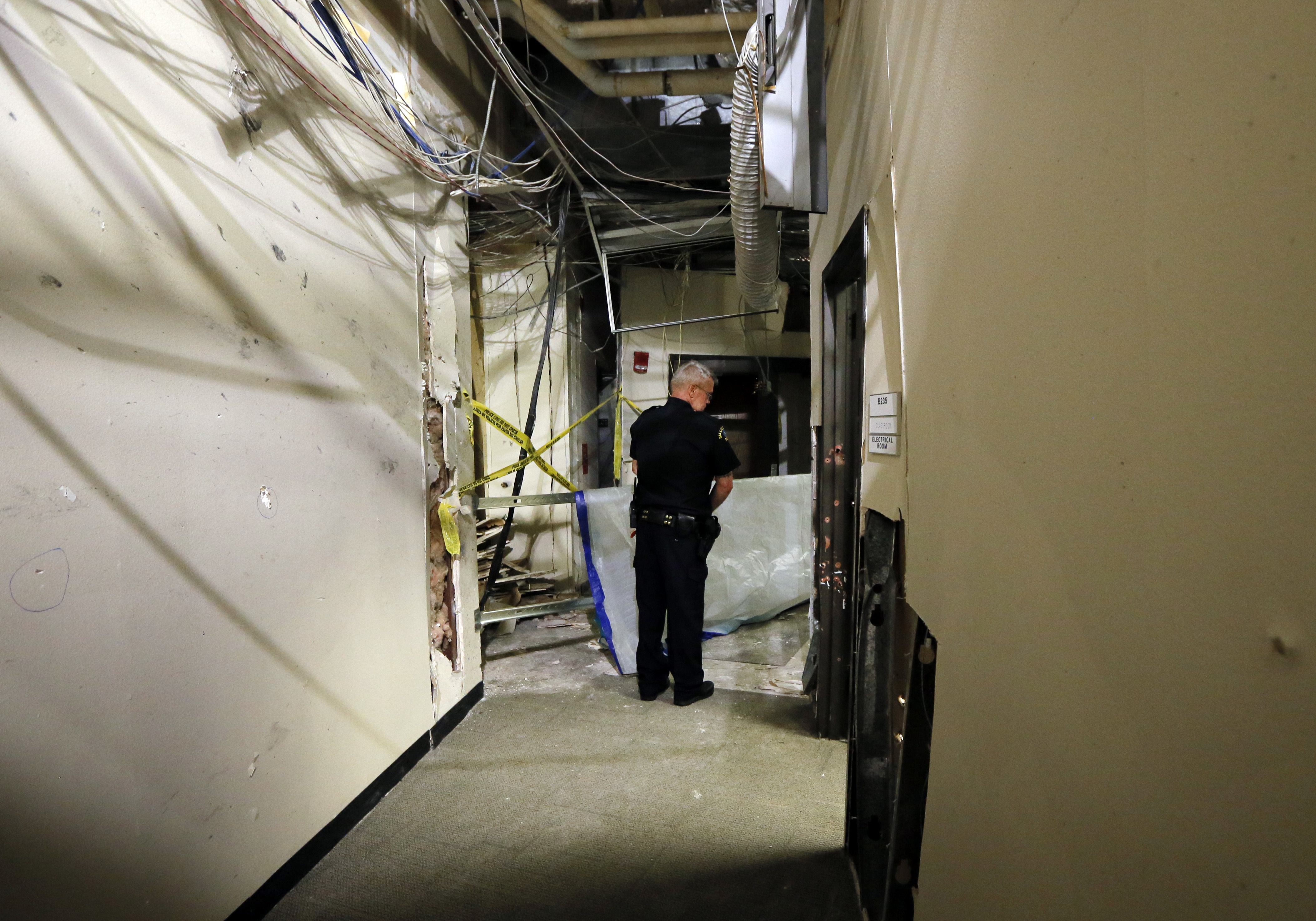 Damage shown from blast that stopped police-killing sniper