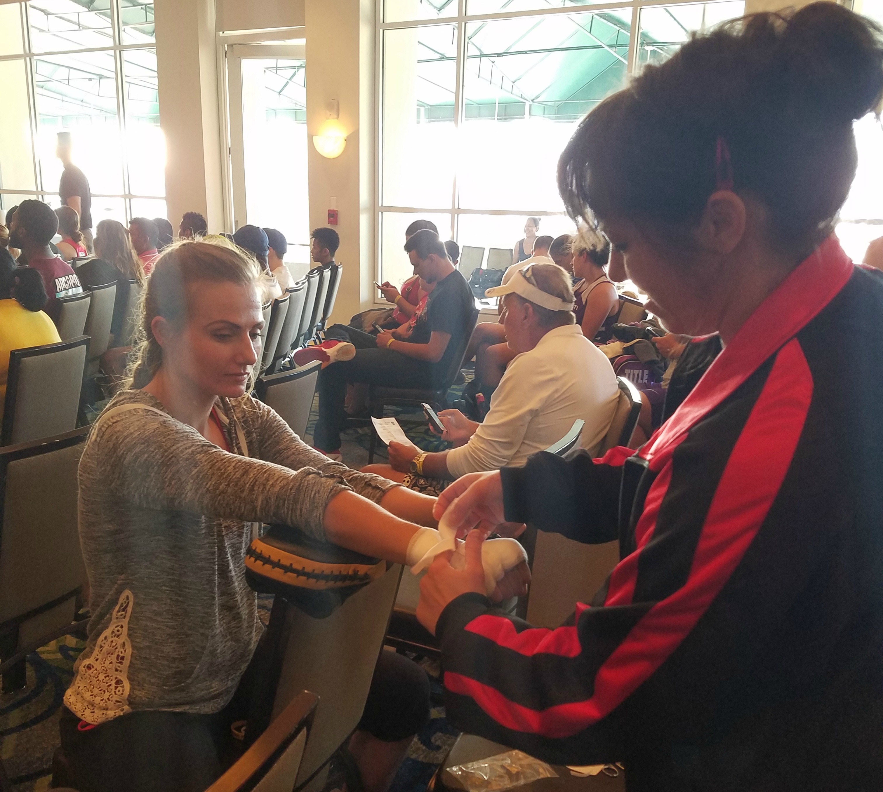 Whitney Gomez (left) with Liz Leddy, her boxing coach for the Golden Gloves tournament in Florida that began on July 6, 2016. Gomez said Leddy agreed to be her coach after learning she traveled from Utah to Florida without a coach. (Photo: Photo courtesy of Whitney Gomez)