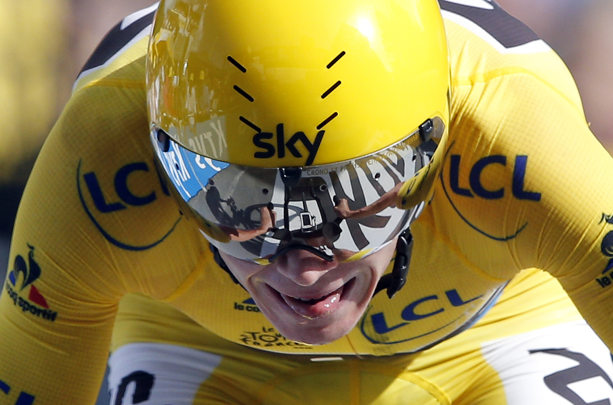 'Never a quiet day': Froome crashes but keeps yellow at Tour