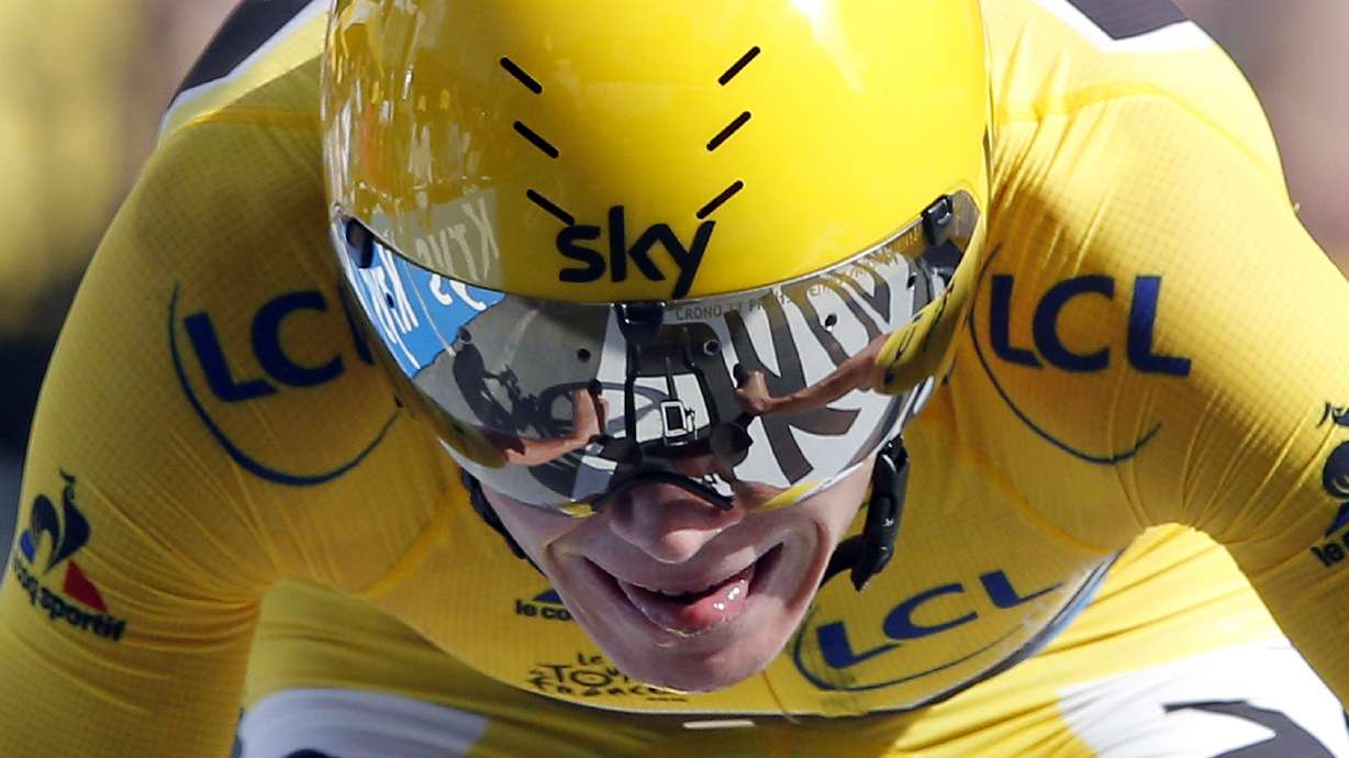 'Never a quiet day': Froome crashes but keeps yellow at Tour