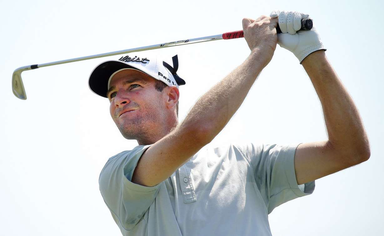 Nicholas Lindheim watches his shot as he joins other golfers competing in day 3 of the Utah Championship in Lehi at Thanksgiving Point on Saturday, July 23, 2016. (Photo: Scott G Winterton, Deseret News)