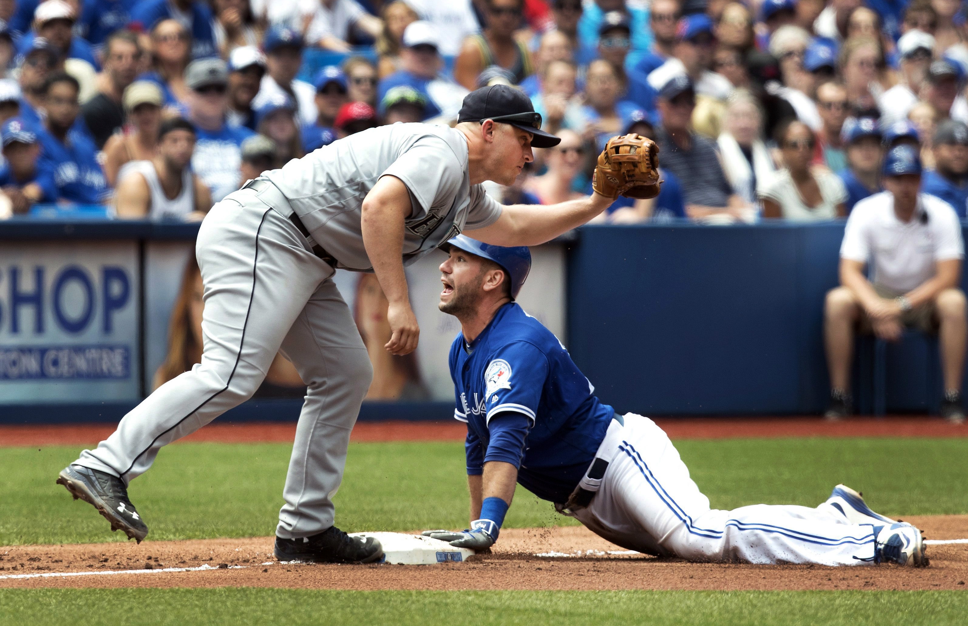 Happ gets career-high 13th win, Blue Jays beat Mariners 2-0