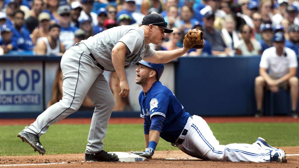 Happ gets career-high 13th win, Blue Jays beat Mariners 2-0