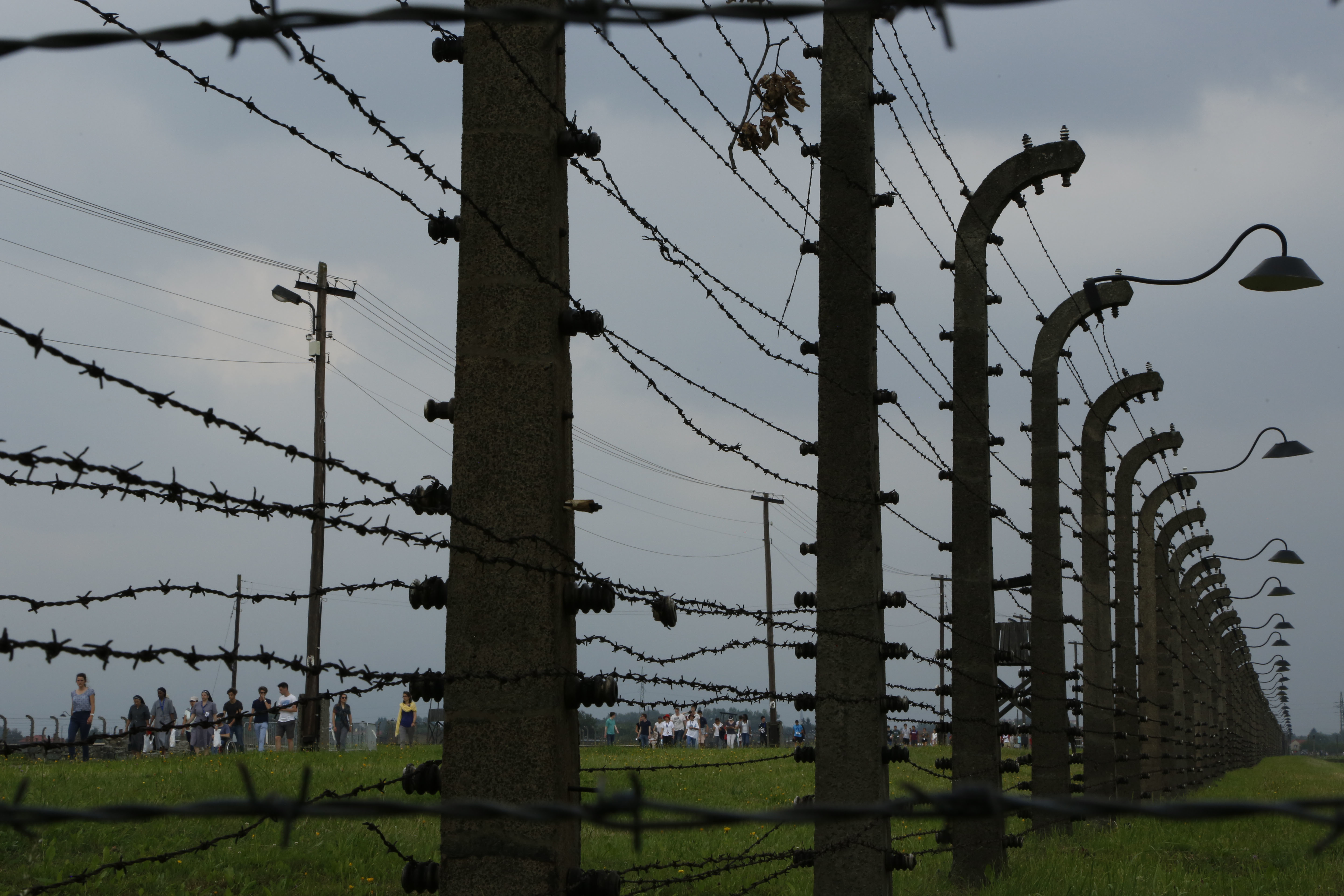 Catholic pilgrims visit Auschwitz ahead of visit by pope