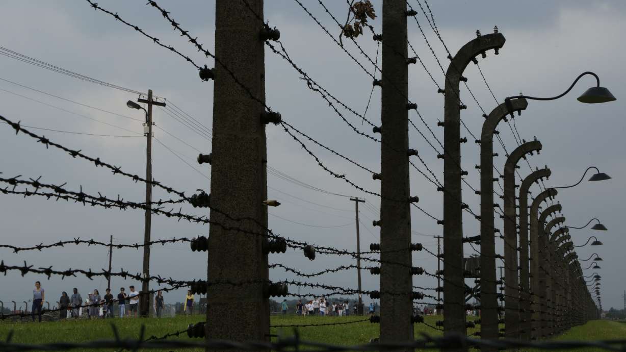 Catholic pilgrims visit Auschwitz ahead of visit by pope