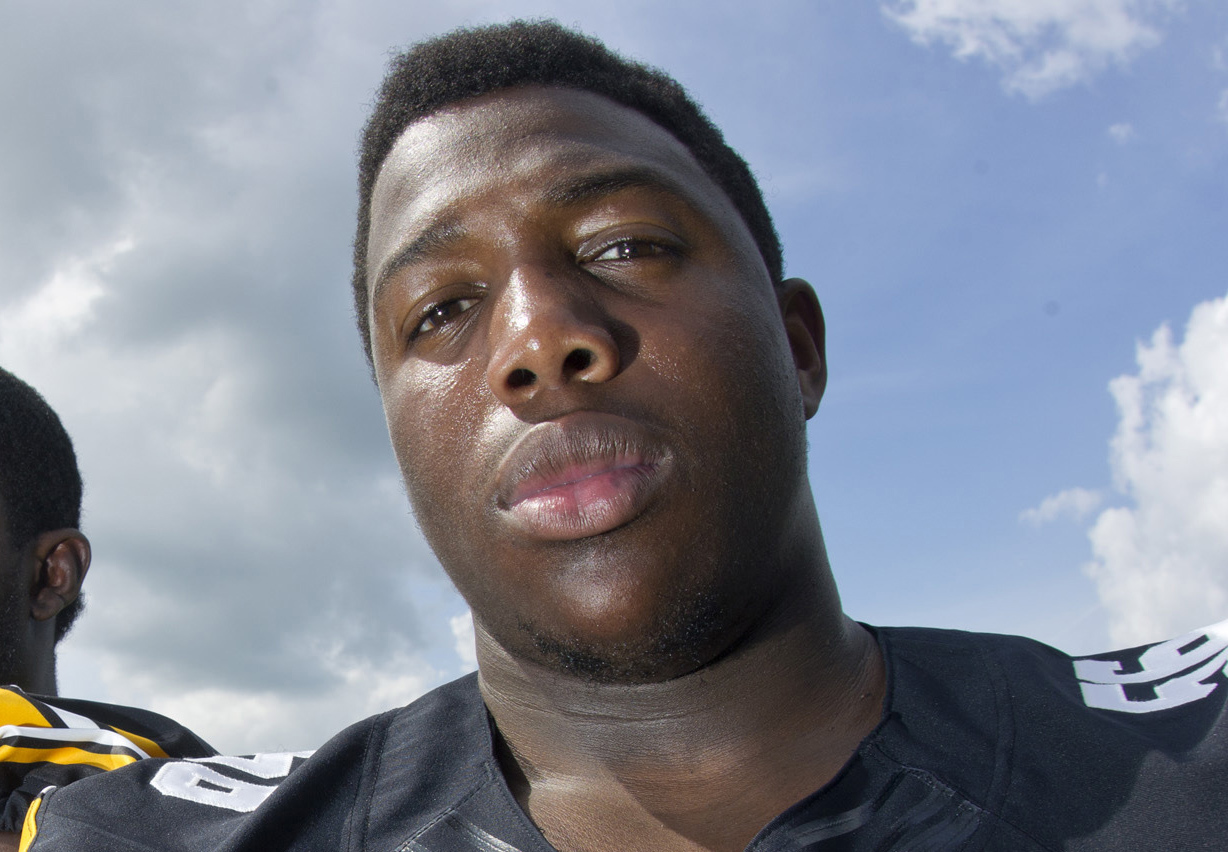 Bodycam video shows Iowa football player searched in park