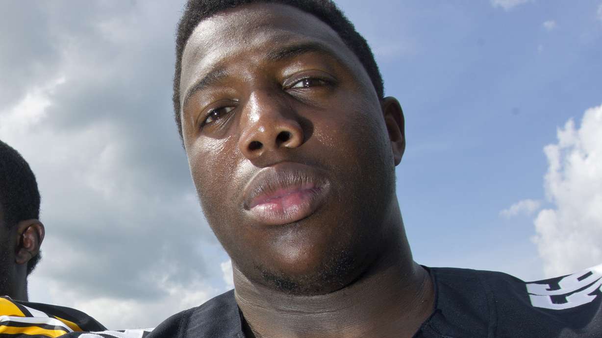 Bodycam video shows Iowa football player searched in park