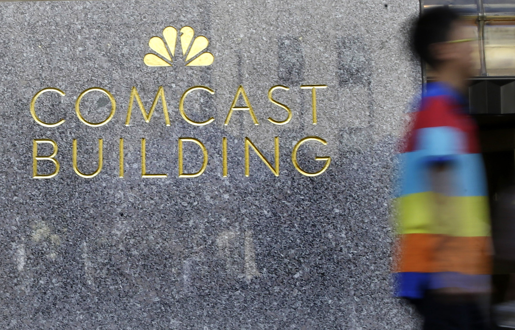 Comcast profit slips due to fewer box-office hits