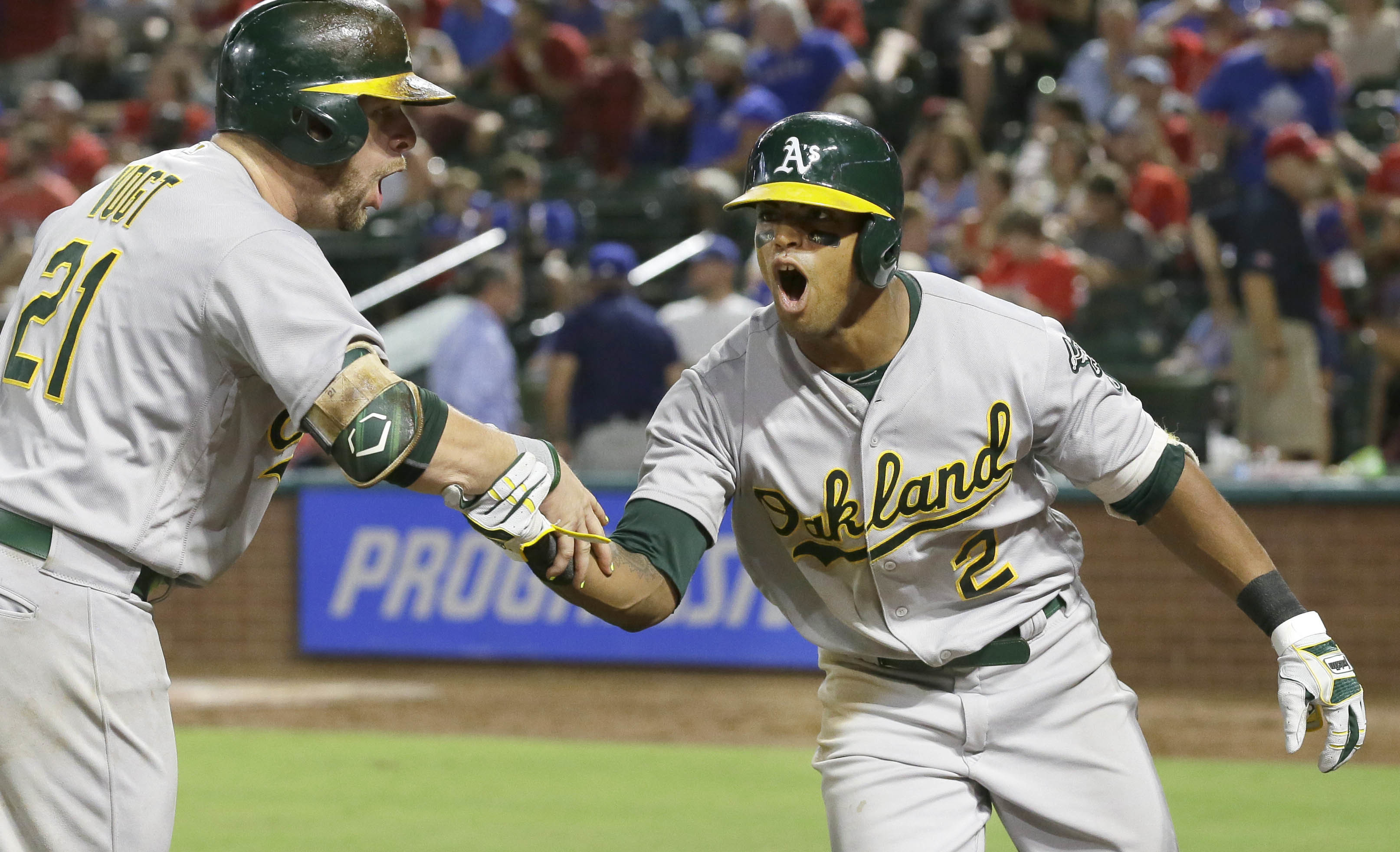 Davis homers twice, Crisp goes deep as A's beat Rangers 6-4