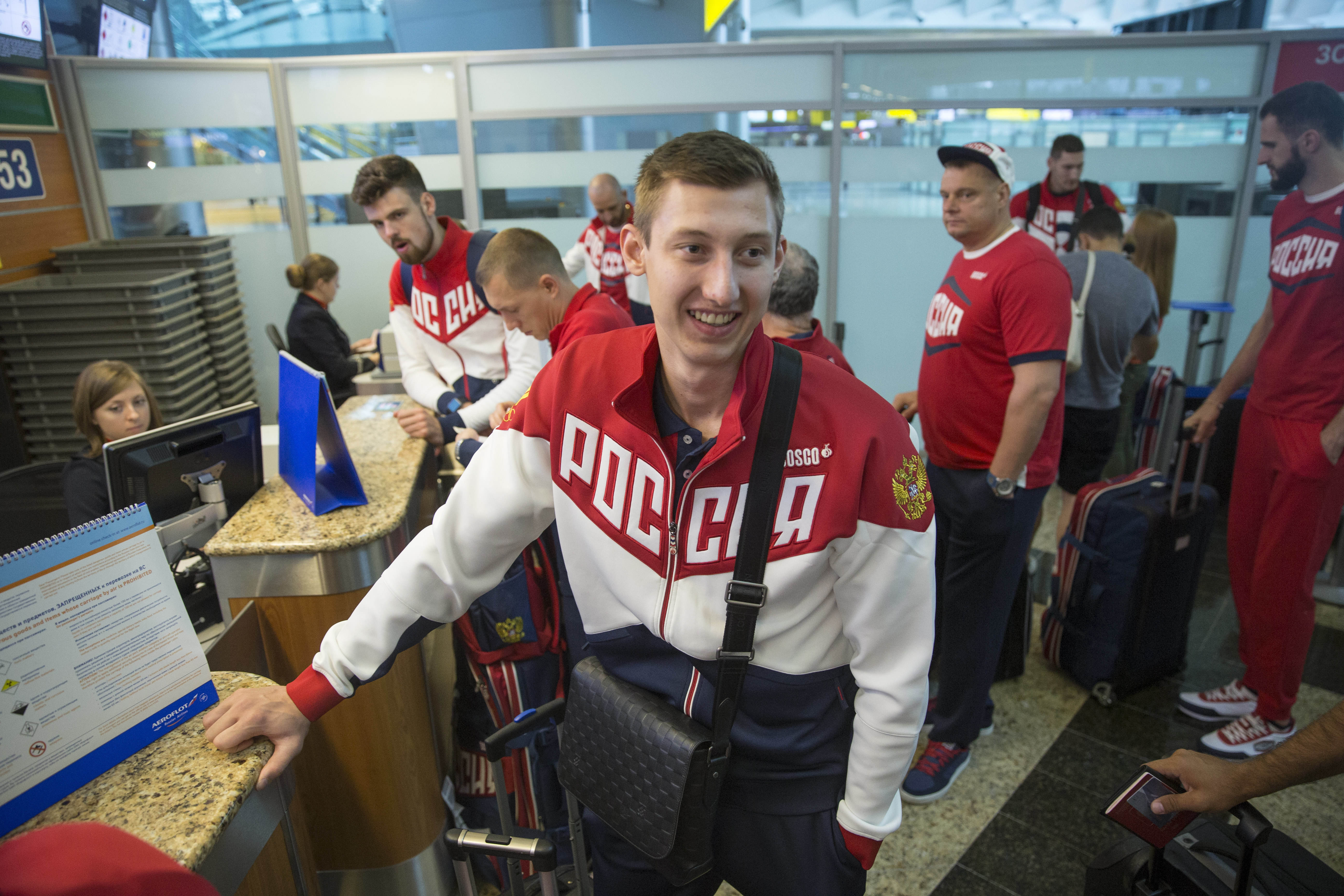 Russia's depleted Olympic team heads for Rio de Janeiro