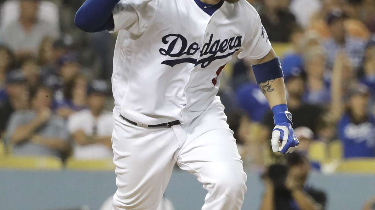 Grandal's single caps 5-run rally as Dodgers beat D-backs