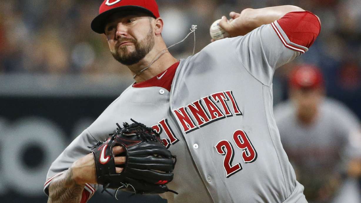 Suarez, Finnegan lead Reds to 6-0 win over Padres