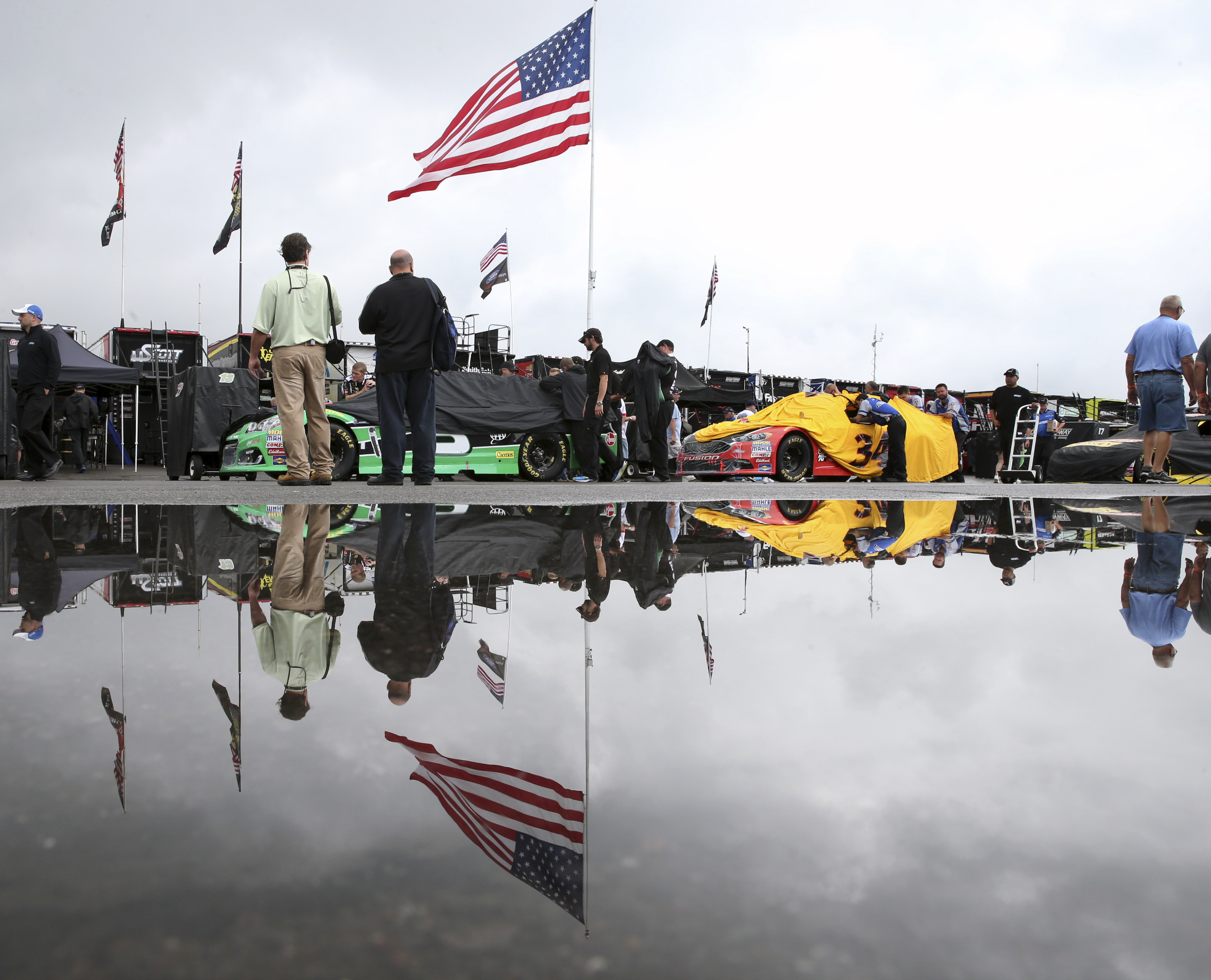 Rain postpones NASCAR Sprint Cup race at Pocono to Monday