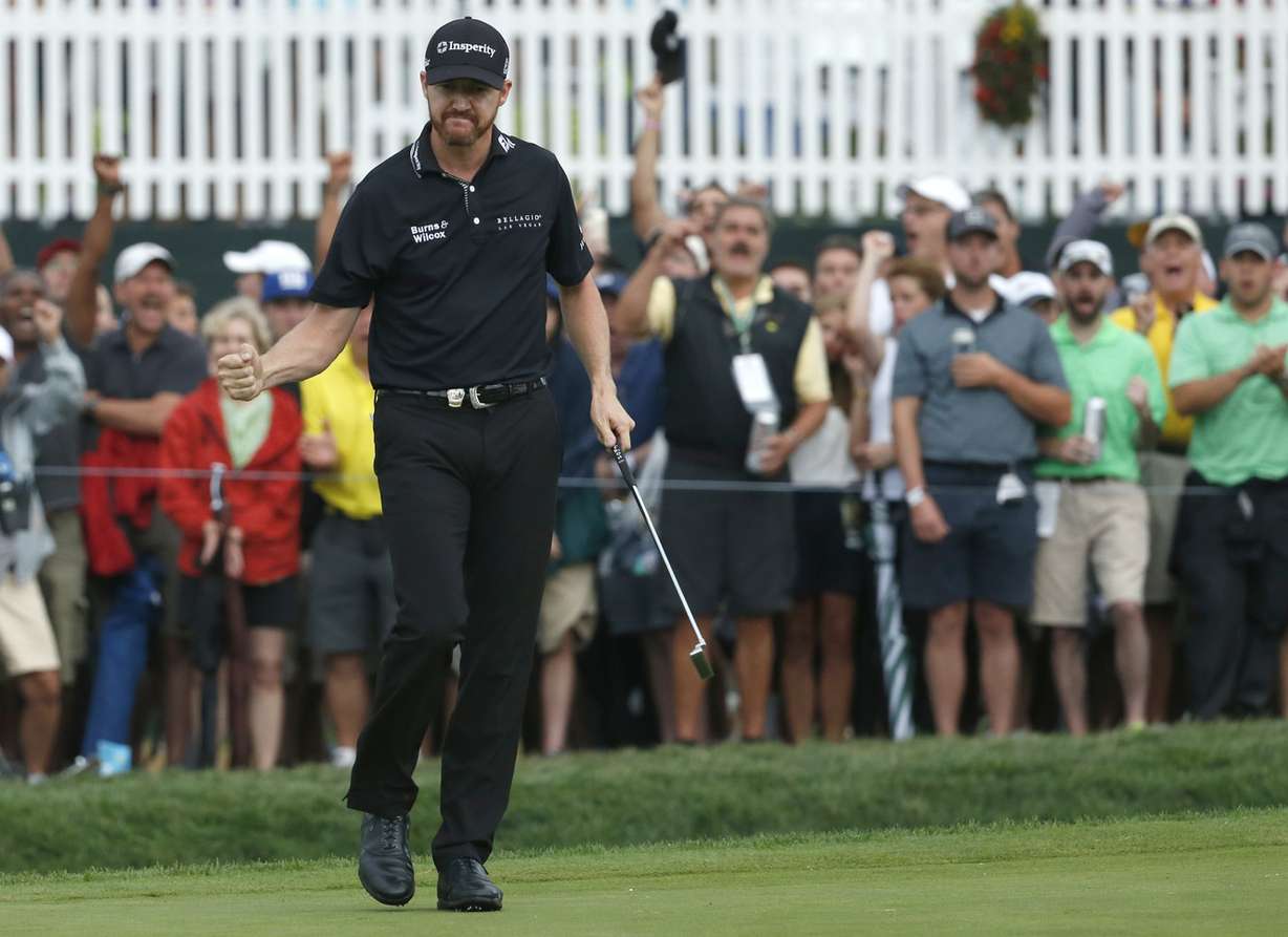 Jimmy Walker reacts after making a birdie on the 17th hole during the final round of the PGA Championship golf tournament at Baltusrol Golf Club in Springfield, N.J., Sunday, July 31, 2016. (Photo: Mike Groll, AP)