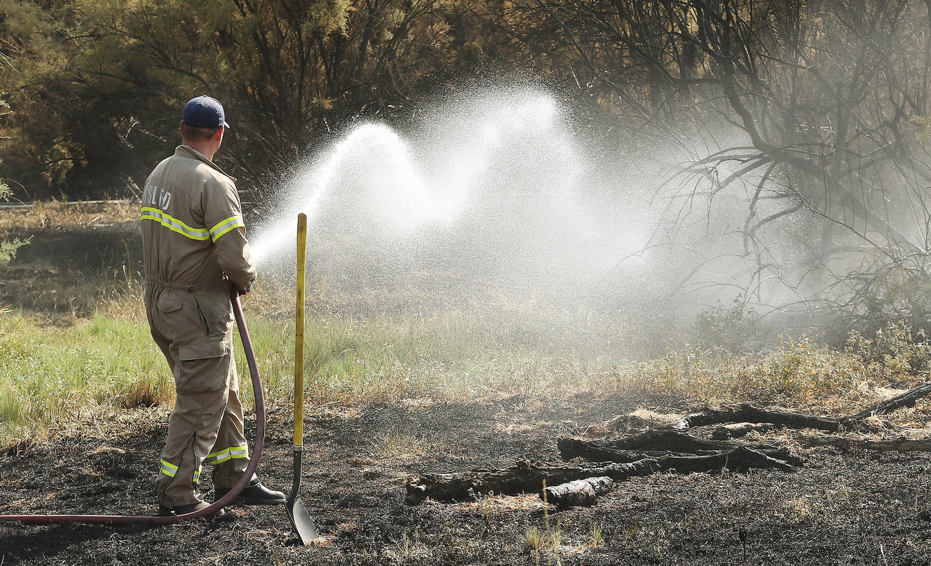 Photos: Firefighters from multiple agencies extinguish blaze on Jordan River Parkway near Oxbow Jail