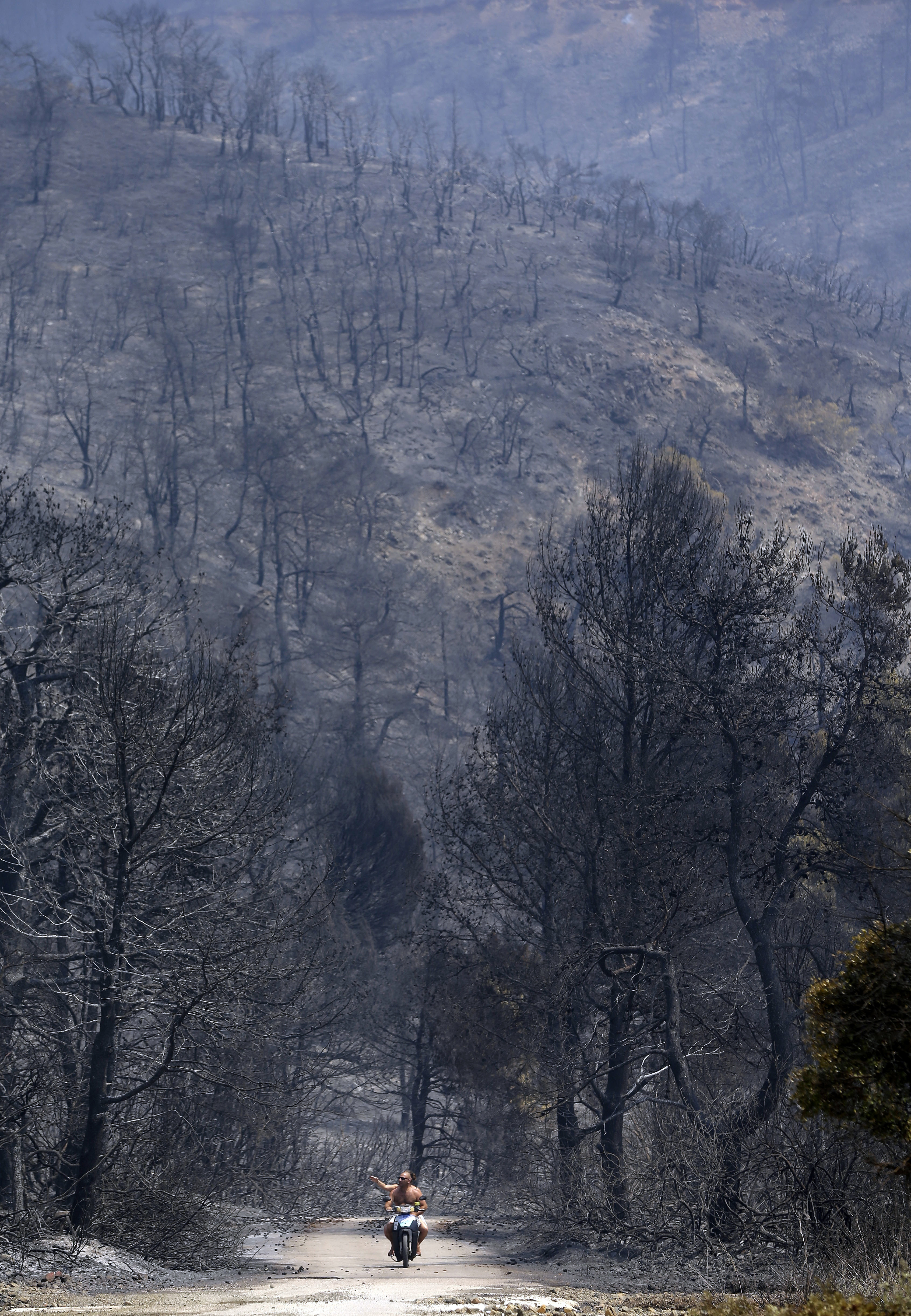 Large wildfire on Greek island abating after 4 days