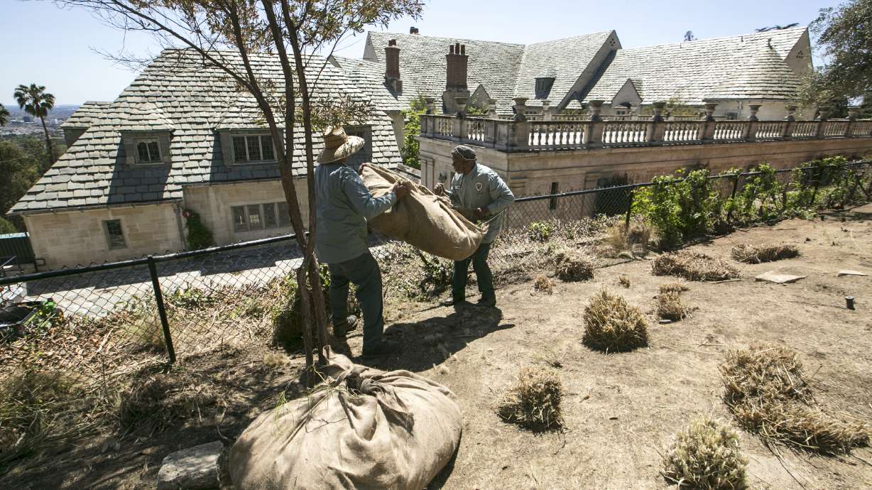 The Latest: California water conservation drops
