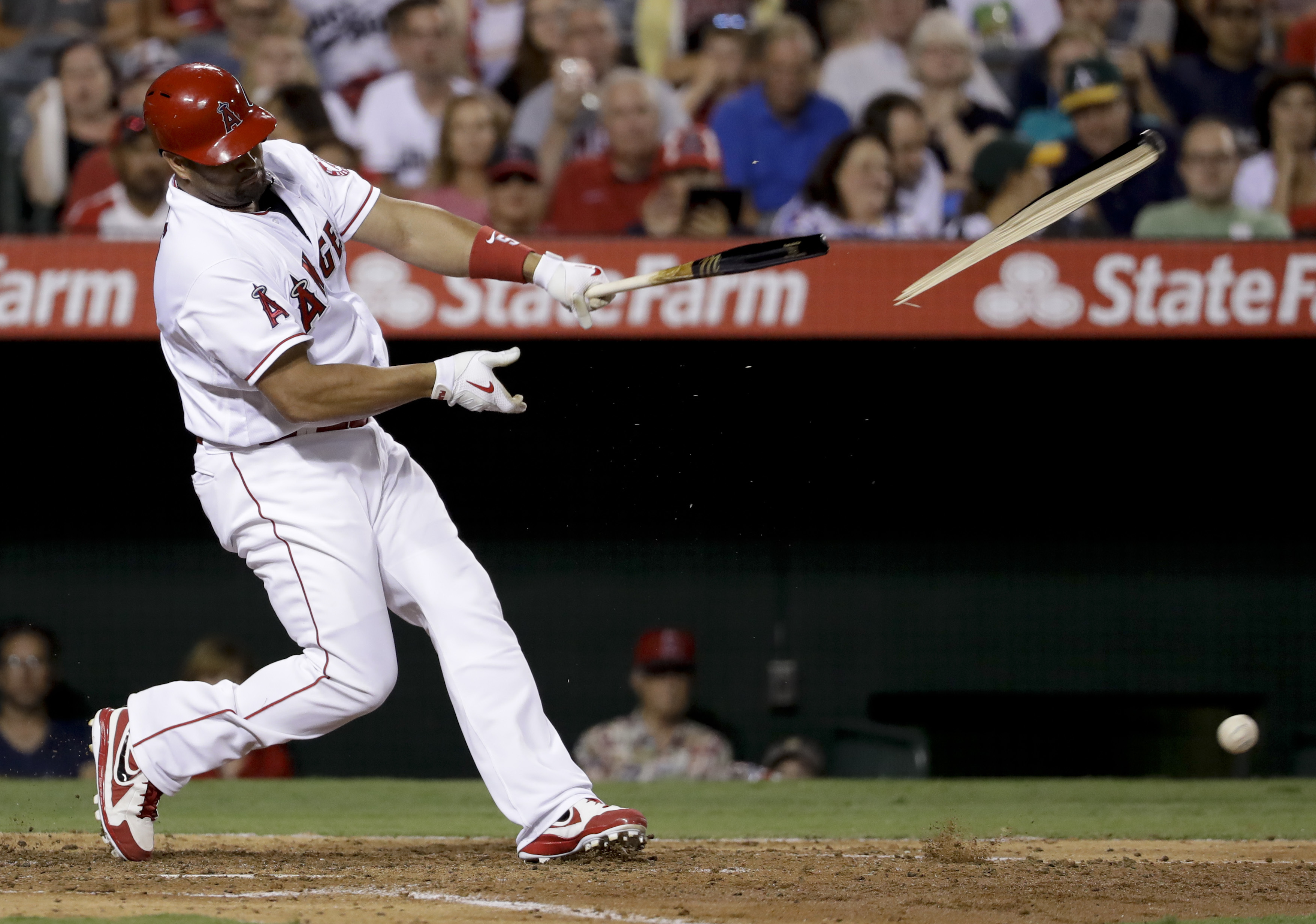 Bedrosian gets first save, Angels beat A's 5-4