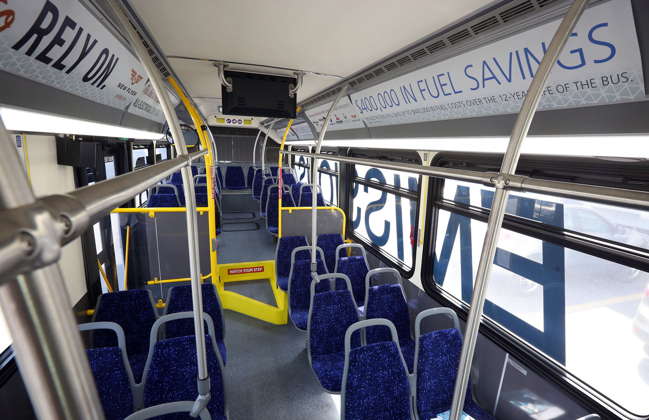 A model bus that is similar to five new zero-emission battery-electric buses from New Flyer that will be used in Salt Lake City is displayed outside the Utah Transit Authority offices in Salt Lake City on Tuesday, Aug. 2, 2016. (Photo: Kristin Murphy, Deseret News)