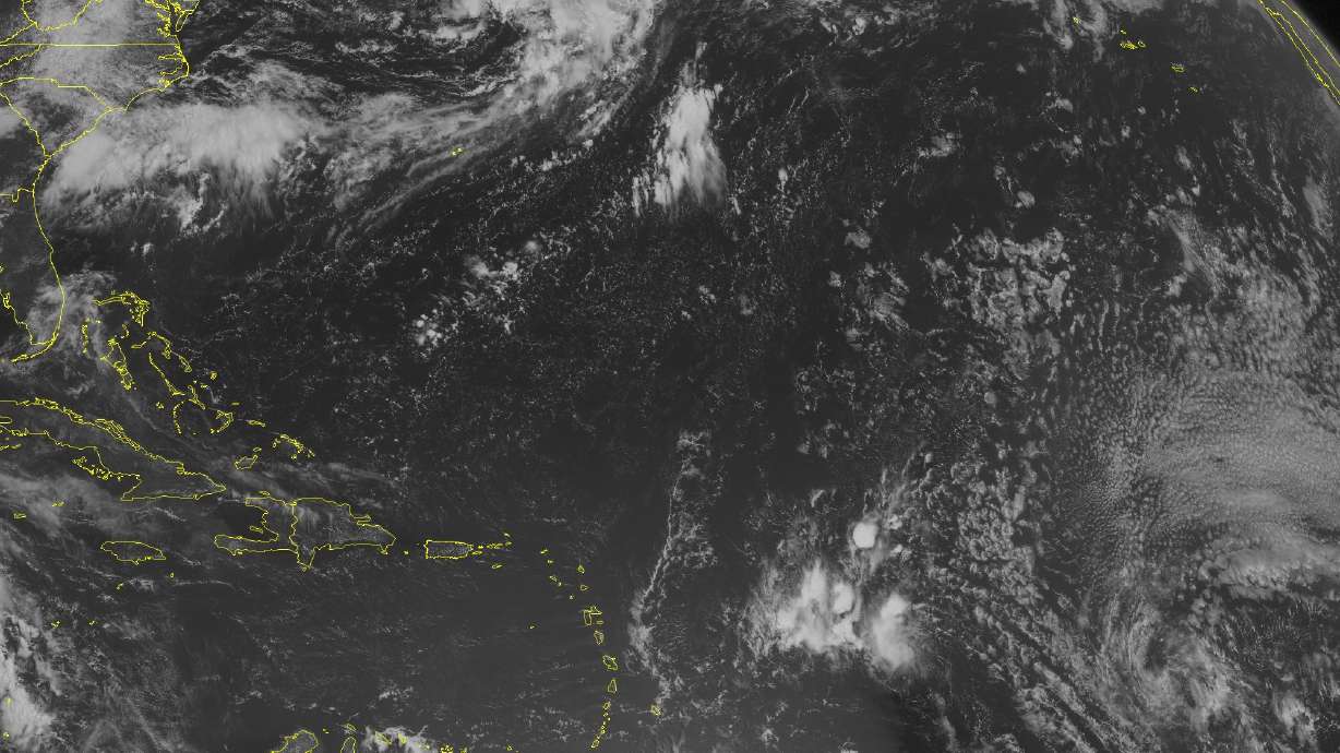 The Latest: Earl upgraded to hurricane as it nears Belize