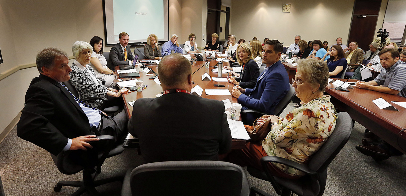 Jonathan Hardy, back to camera, state of Utah Housing and Community Development, speaks during a meeting of the Collective Impact on Homelessness Steering Committee in Salt Lake City on Wednesday, Aug. 3, 2016. (Photo: Ravell Call, Deseret News)