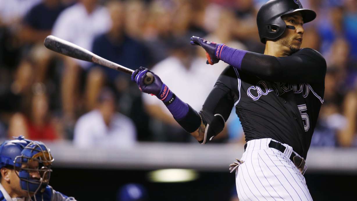 Gonzalez hits 2 HRs before leaving game with ankle injury