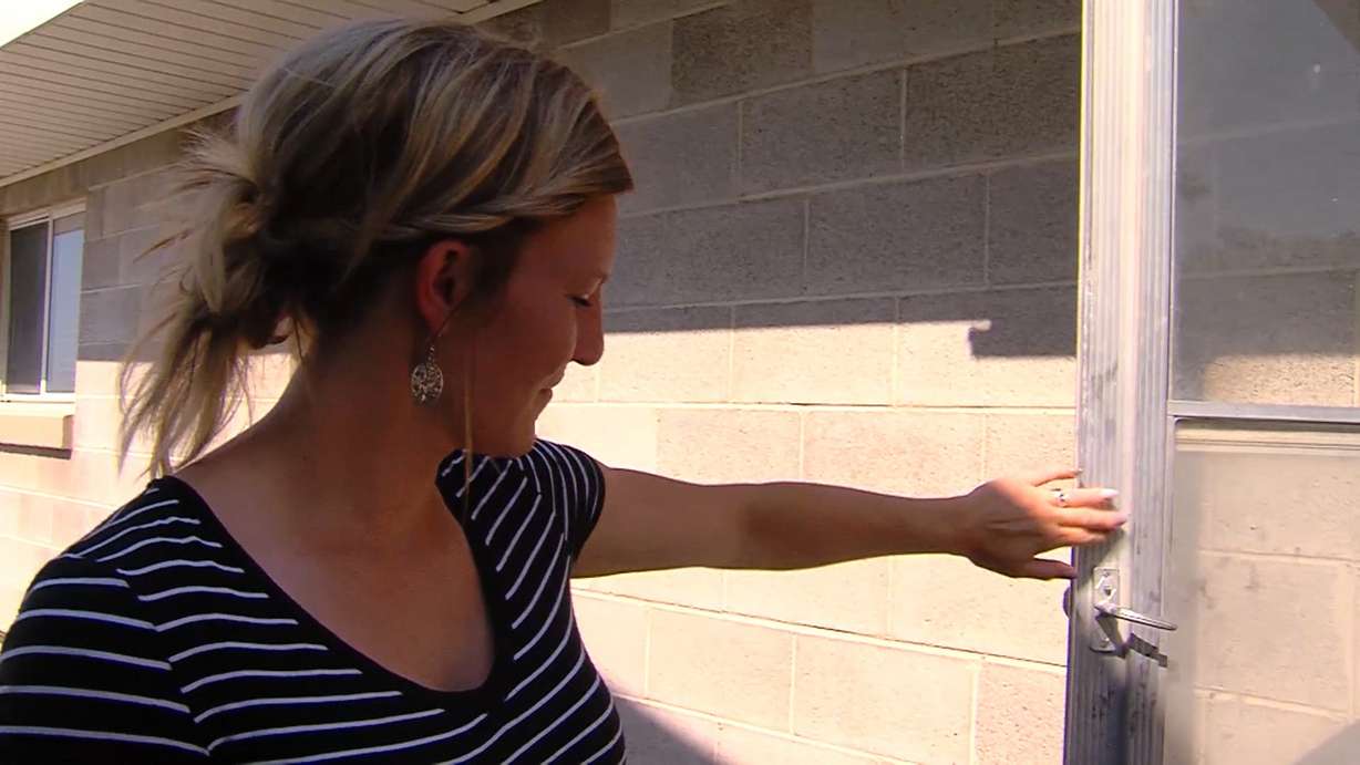 MeChel Orrock is grateful for her brother, Matt Hunt. He went to her house after neighbors reported seeing people go to the back of the house. Hunt used his skills herding cattle to confront a group of men who were arrested in connection with a home burglary. In Plain City, Weber County, Wednesday, Aug. 3, 2016. (Photo: Adam Sotelo, Deseret News)