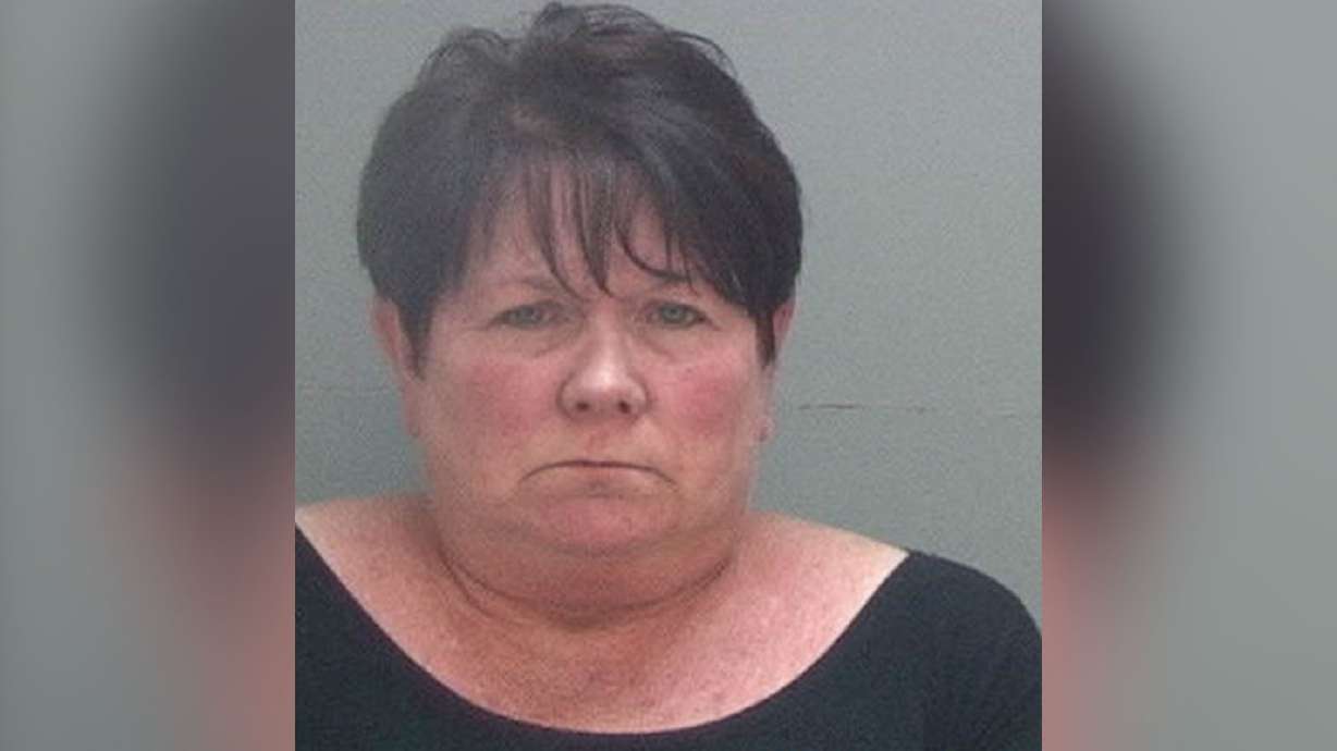 Woman arrested following fatal crash on Highland Drive