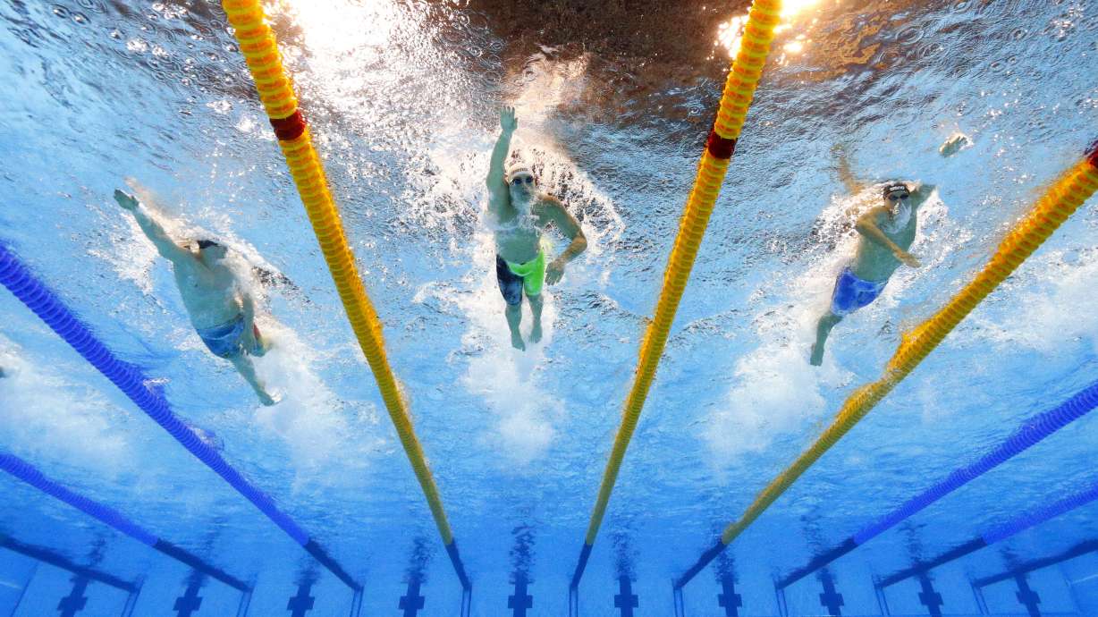 Banned Russians quietly added back to Olympic swimming