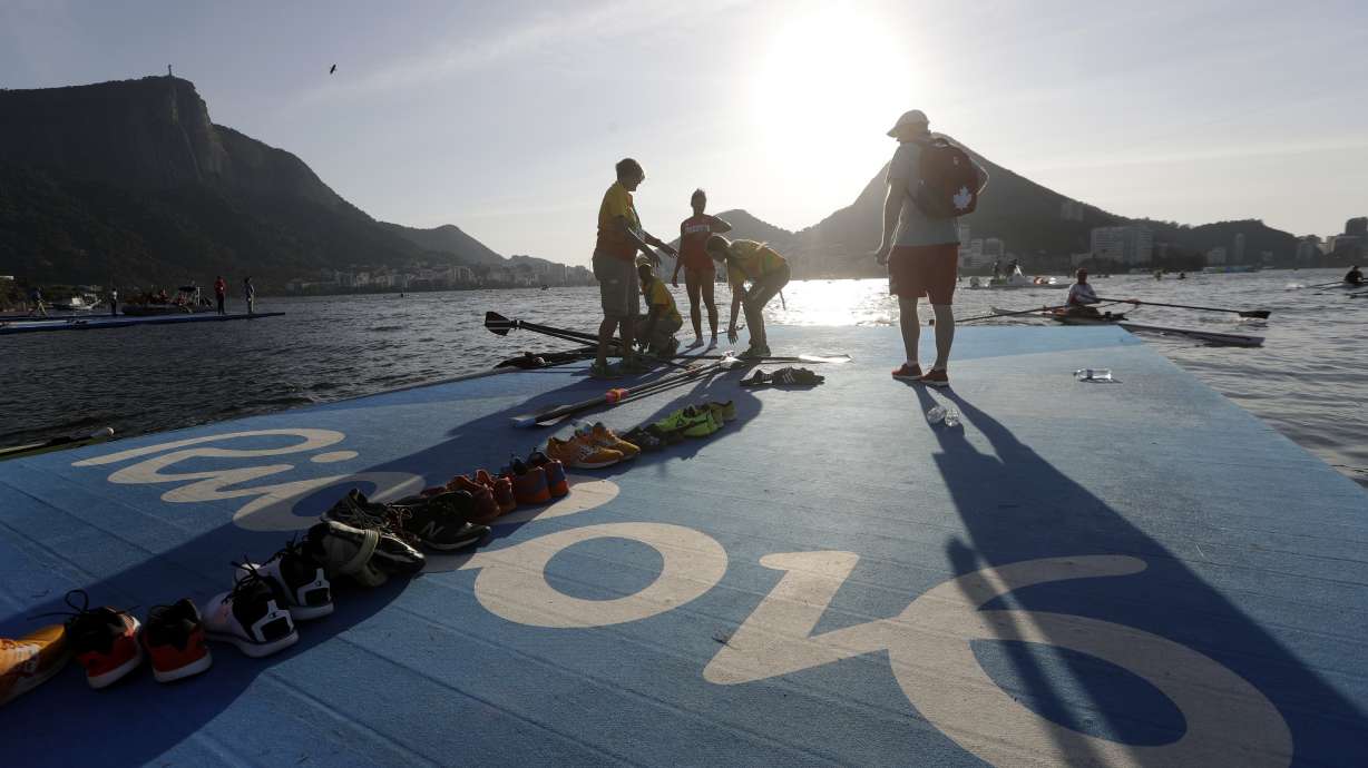 The Latest: US men take 4x100 freestyle gold, Phelps' 19th